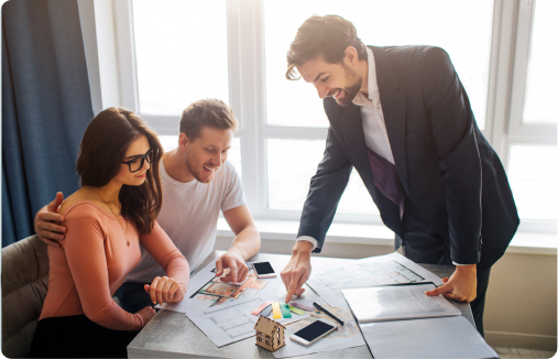Real estate agent and client shaking hands